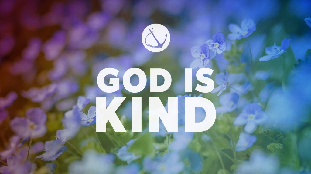 Image of a field of small blue flowers with text overlaid, "God is Kind"