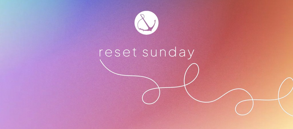 Image of a colorful gradient with text overlaid, "Reset Sunday"